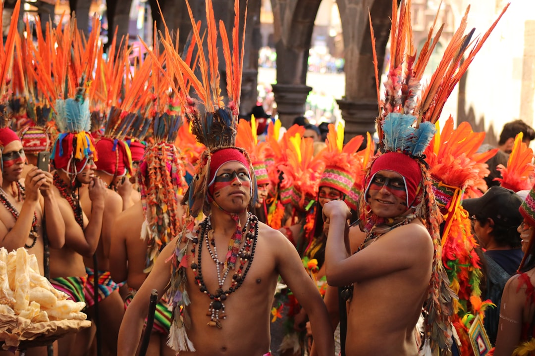 people wearing costumes, This photo was taken at the main square of Cusco during the festival of the Sun during the wint