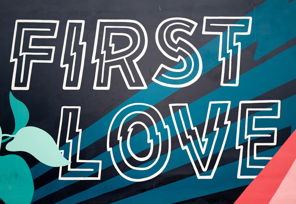 first love text on blue background