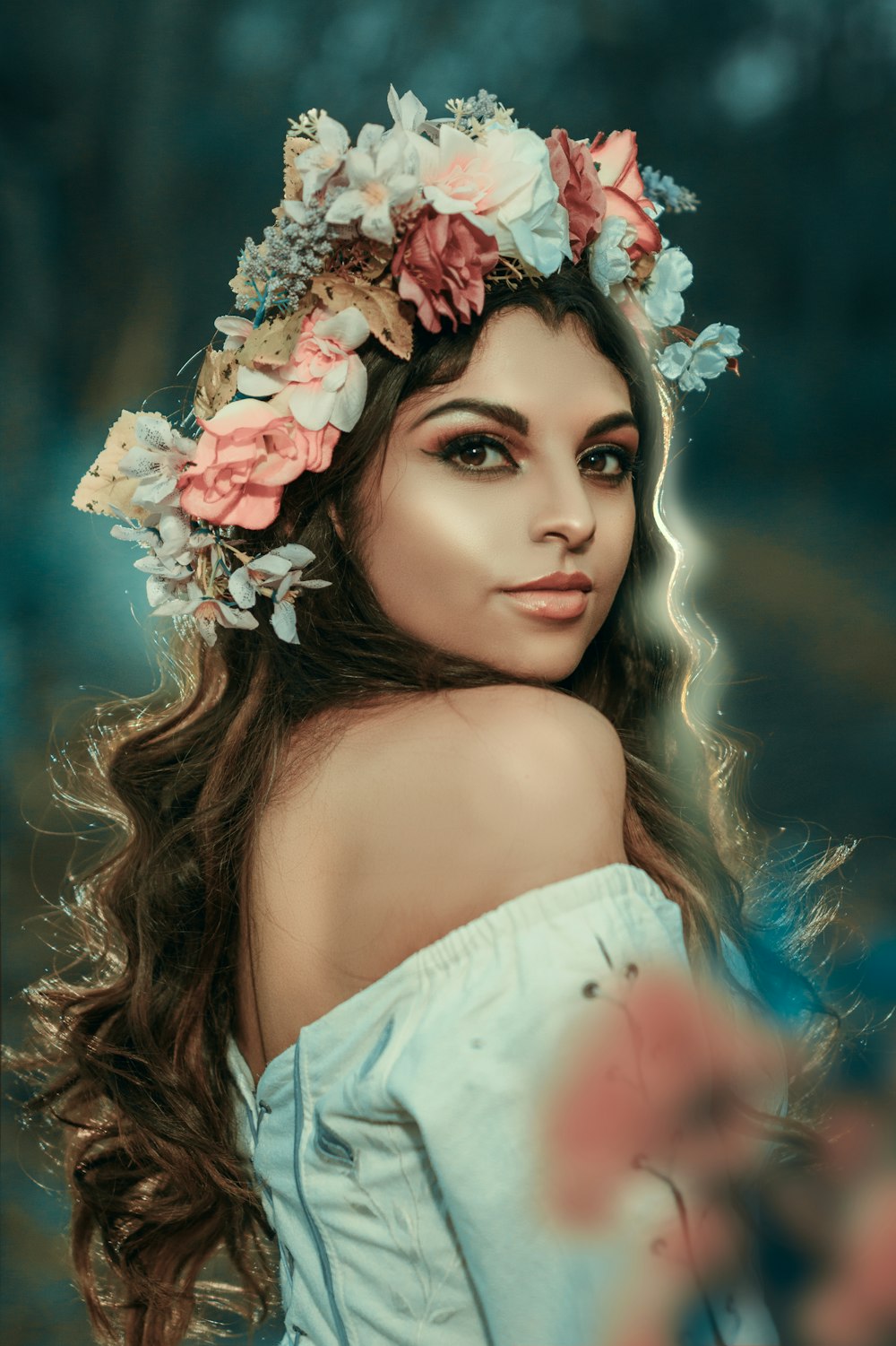 woman wearing multicolored floral headdress