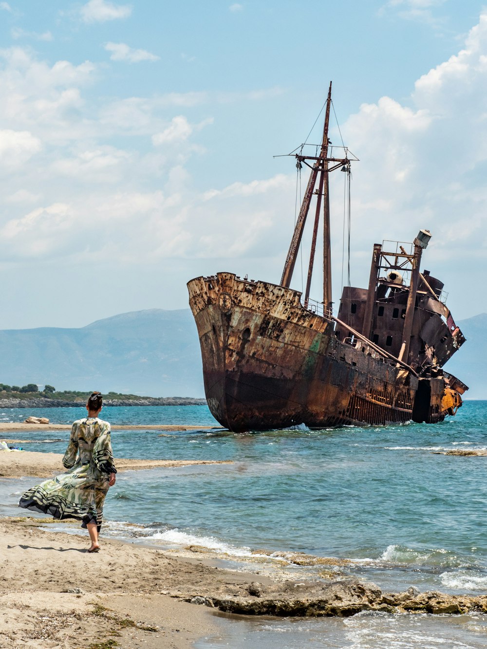 brown ship on shore