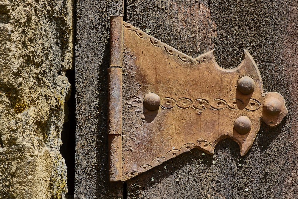 brown metal door hinge