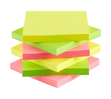 A stack of colorful sticky notes are neatly piled on top of one another. The pads alternate in bright yellow, pink, and green colors, creating an eye-catching pattern. Each pad is square-shaped with slightly rounded edges and appears to be made of paper.