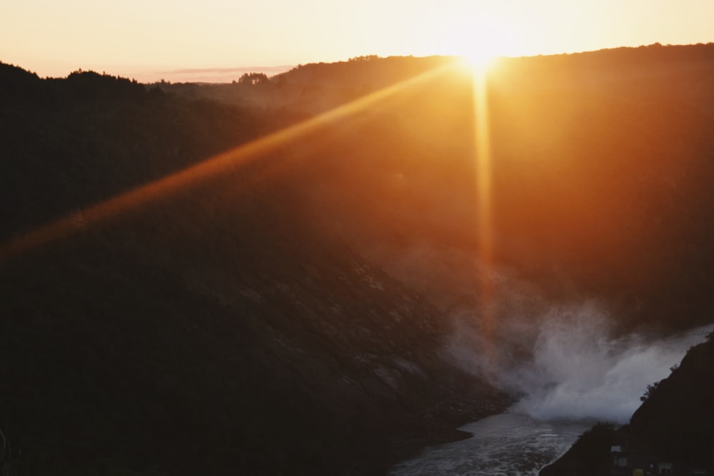 silhouette of mountain during golden hour