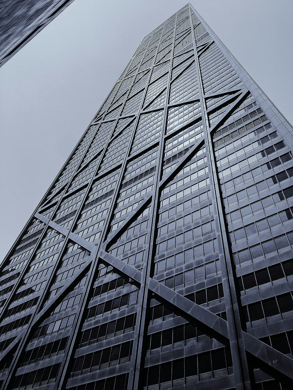 low-angle photo of glass building