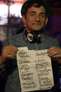 A friendly person filling out an order form on a laptop with music notes floating around.