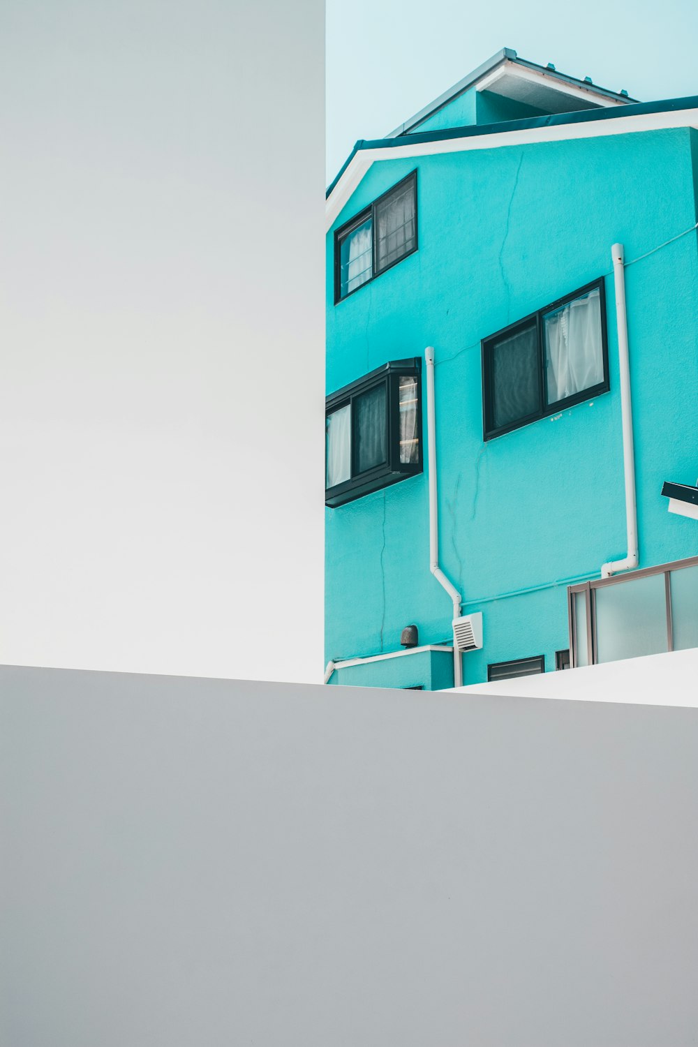 teal painted concrete building