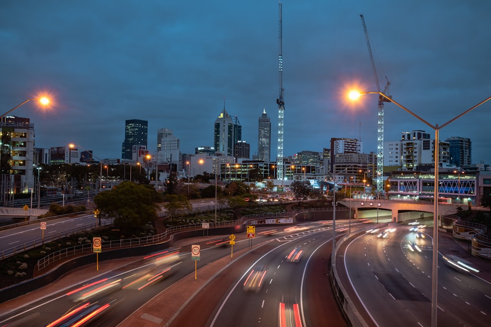 time lapse photography of vehicle on road