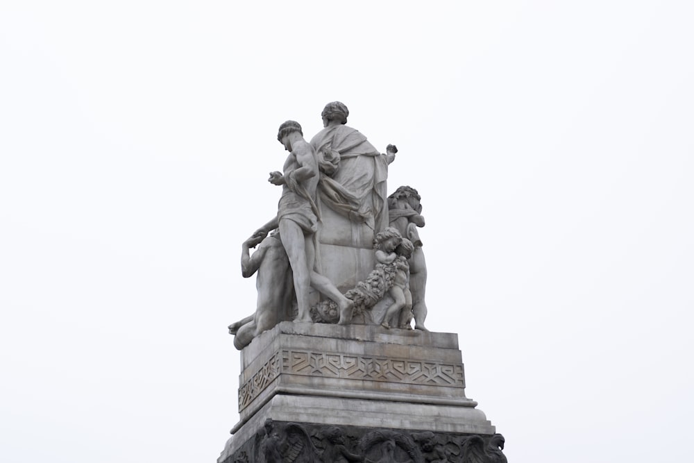 gray concrete statue during daytime