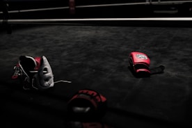 pair of red boxing gloves