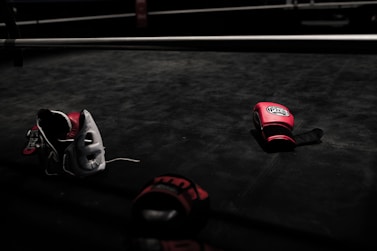 pair of red boxing gloves