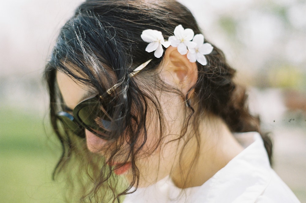 woman wearing black framed sunglasses