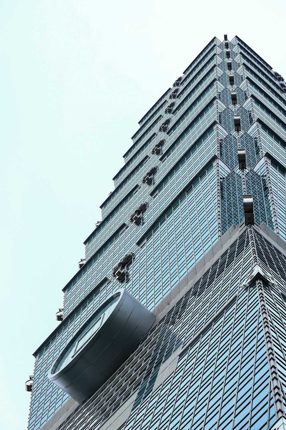 low-angle photography of curtain wall building