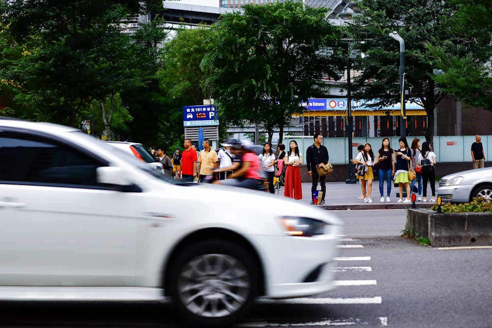 white car on road