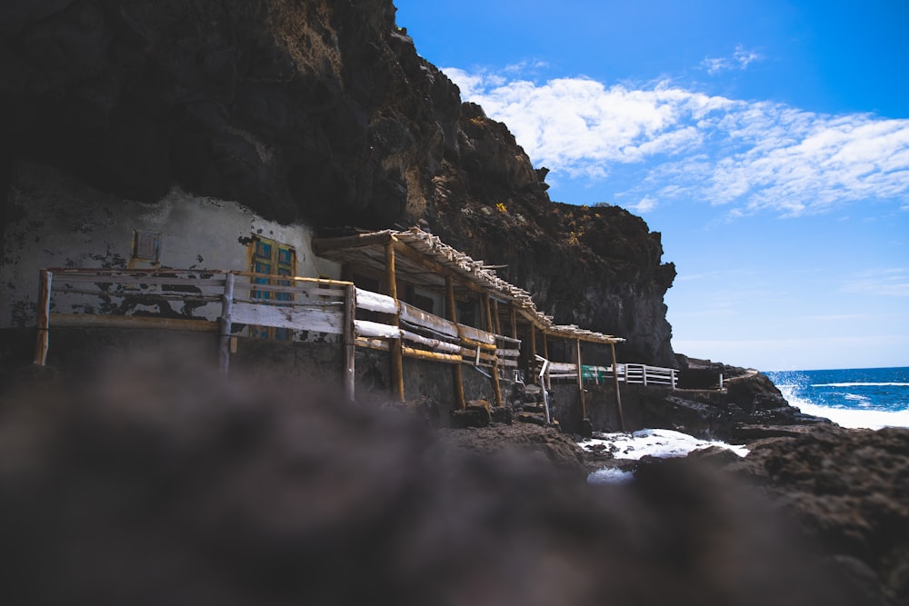 brown house on shore during daytime