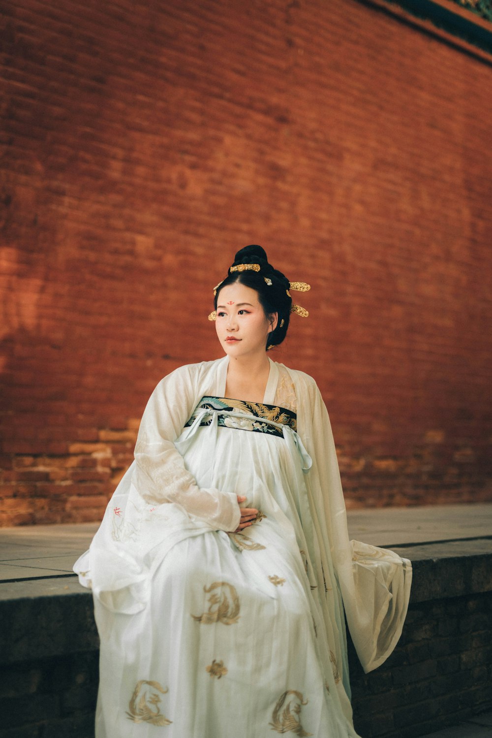 woman wearing white traditional dress