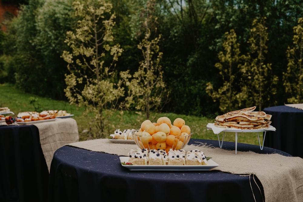 variety of desserts on a table outdoor