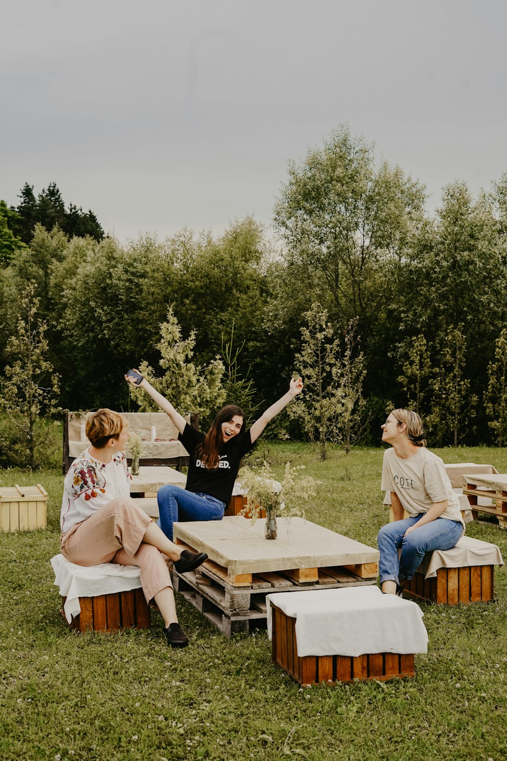 women sitting on chairs outdoor