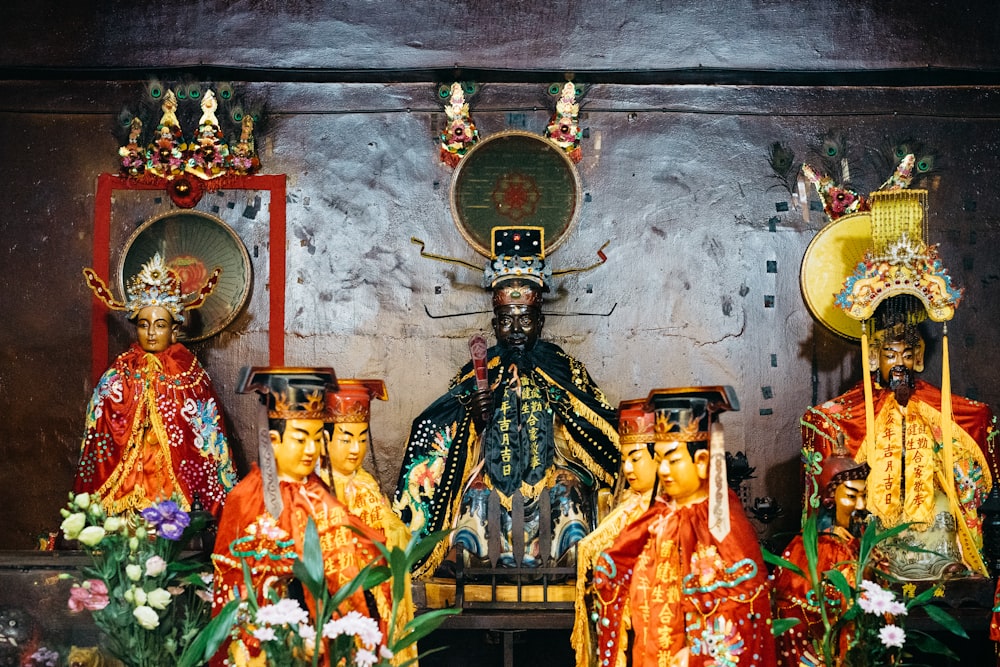 seven assorted dolls on display