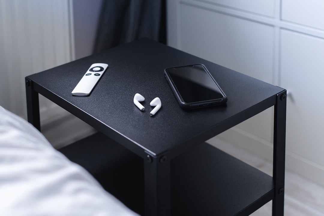 gadgets on top of a side table