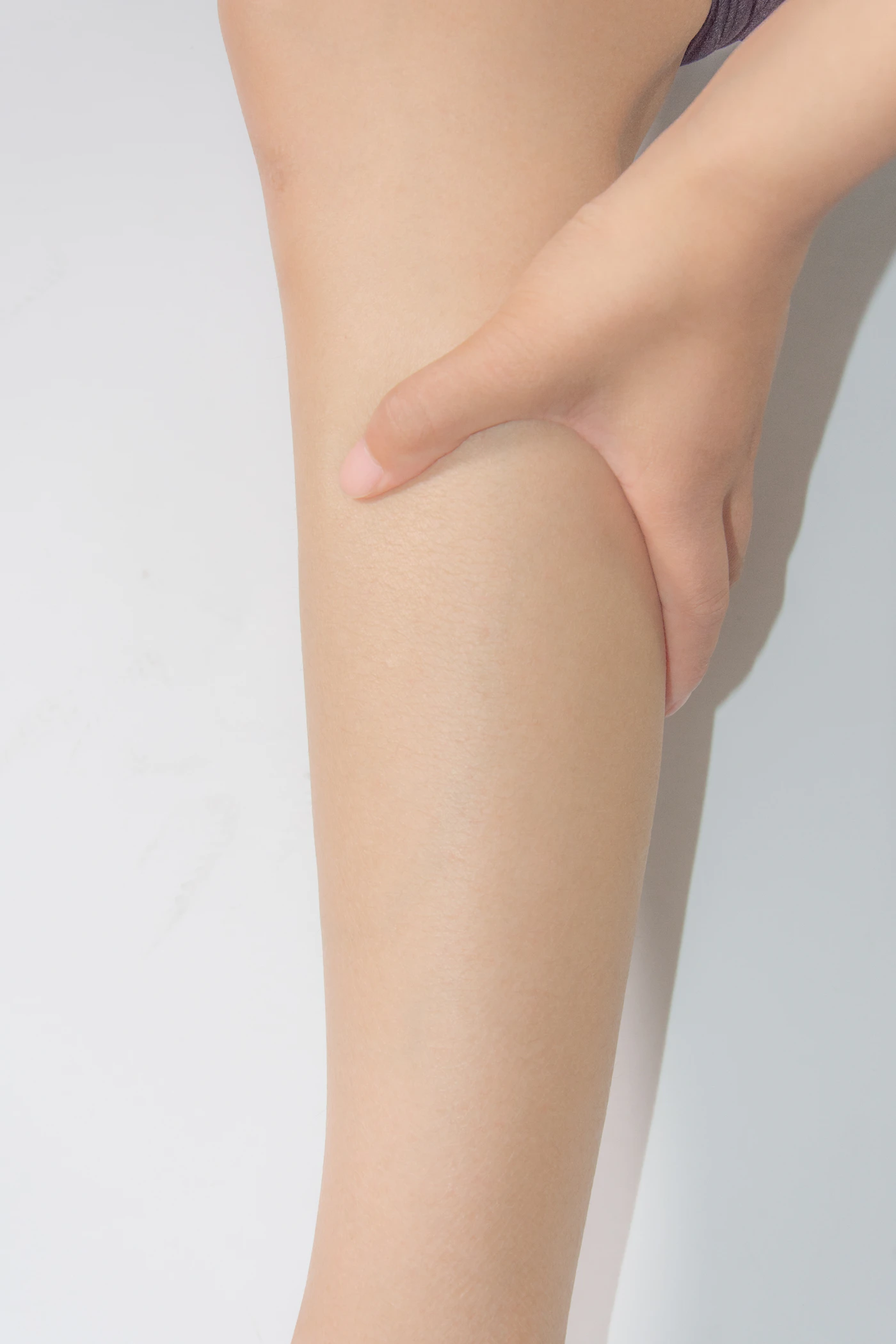 Close-up of smooth leg skin, representing the area reviewed across a staged laser hair removal course