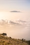 landscape photo of mountain under cloudy sky during daytime