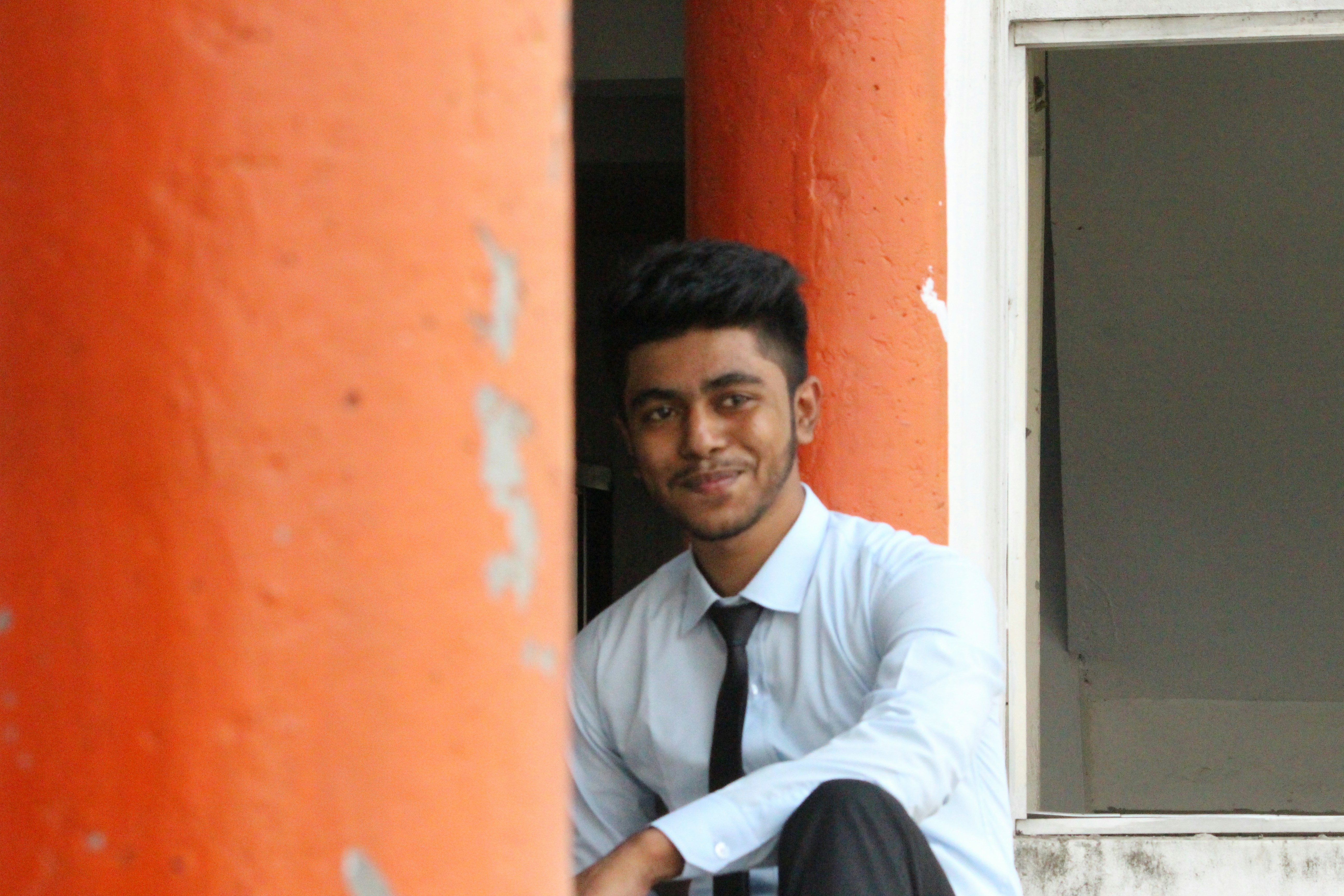 man smiling on focus photography