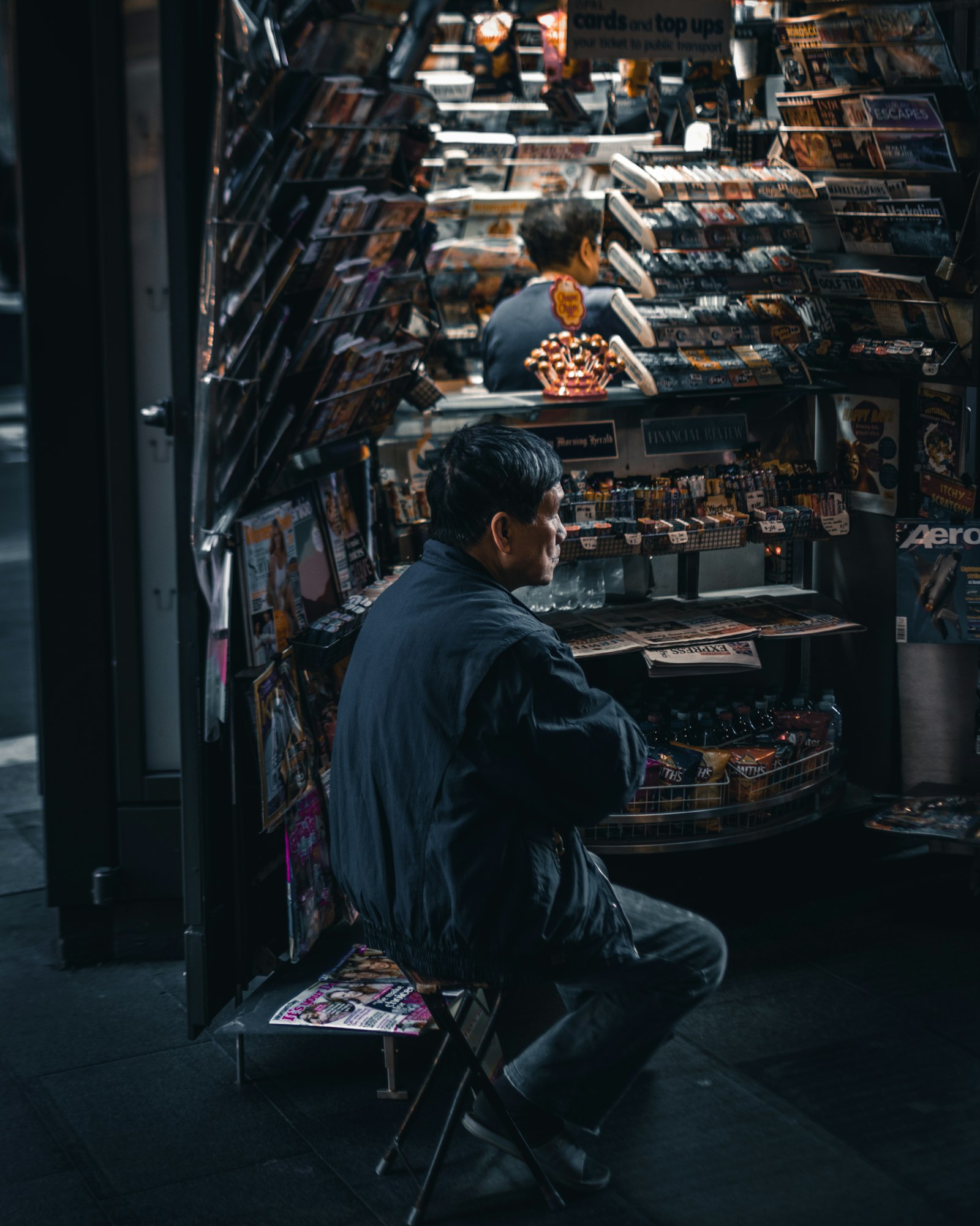 Nikon D5600 + Nikon AF-S DX Nikkor 35mm F1.8G sample photo. Man sitting on chair photography