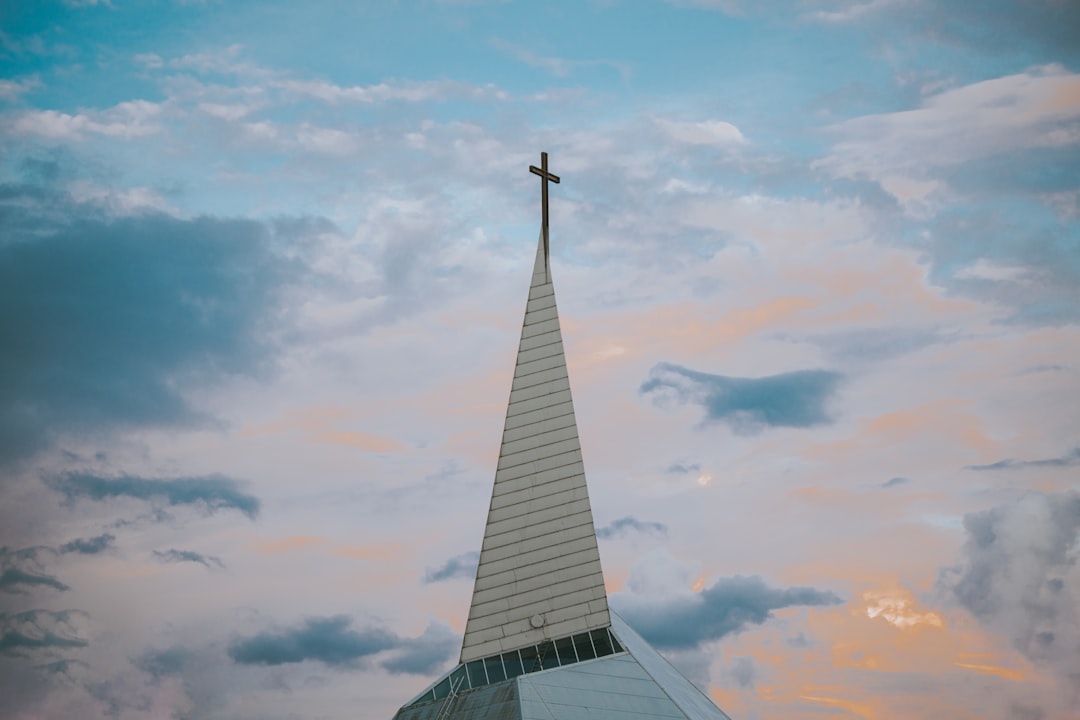 white church under blue sky during daytime