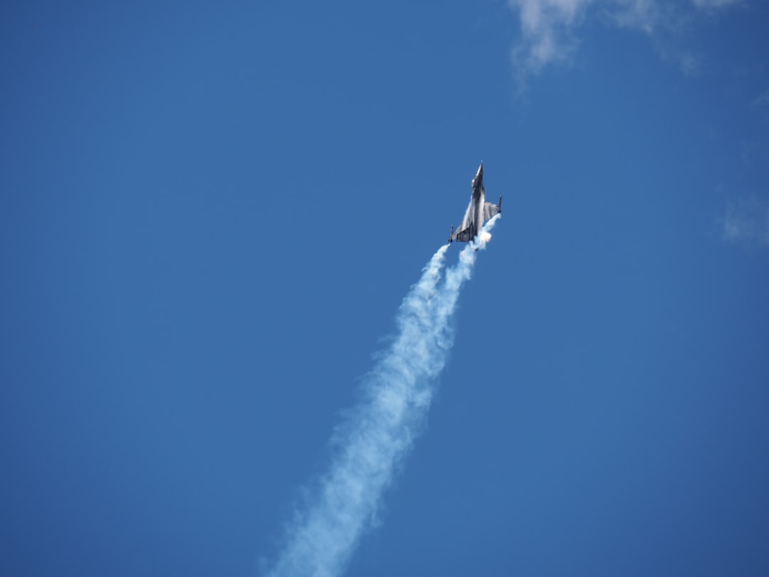 grey jet airplane during daytime