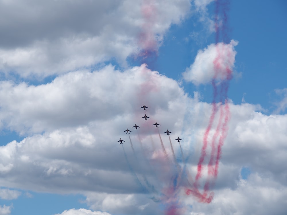 photography of eight air plane during flight during daytime