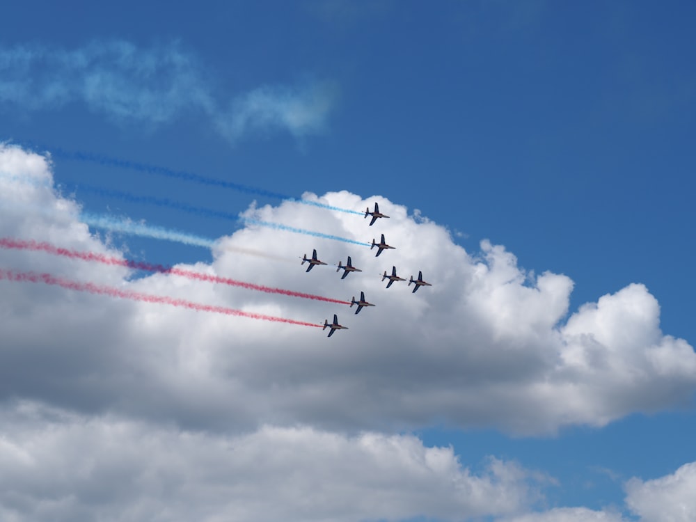 eight grey airplanes during daytime