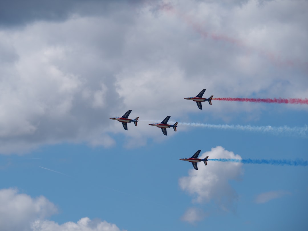 four jetplanes with tracks