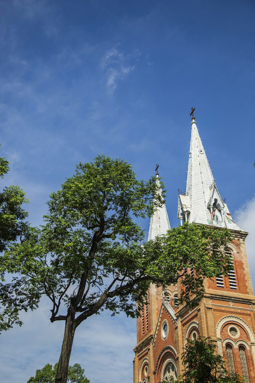 white and brown church steeples