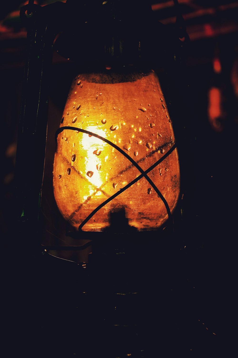 clear glass burning lamp close-up photography