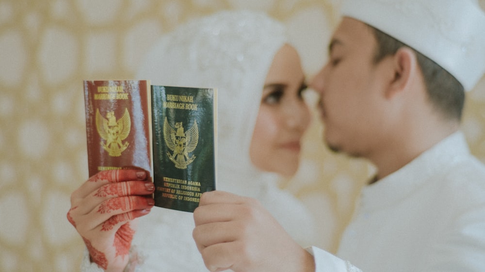 couple holding passports