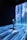 A person stands in a dark room surrounded by digital projections of cascading blue vertical lines resembling a waterfall, with colorful floral patterns scattered throughout. The room is illuminated by the vivid projections, creating an immersive and serene environment.
