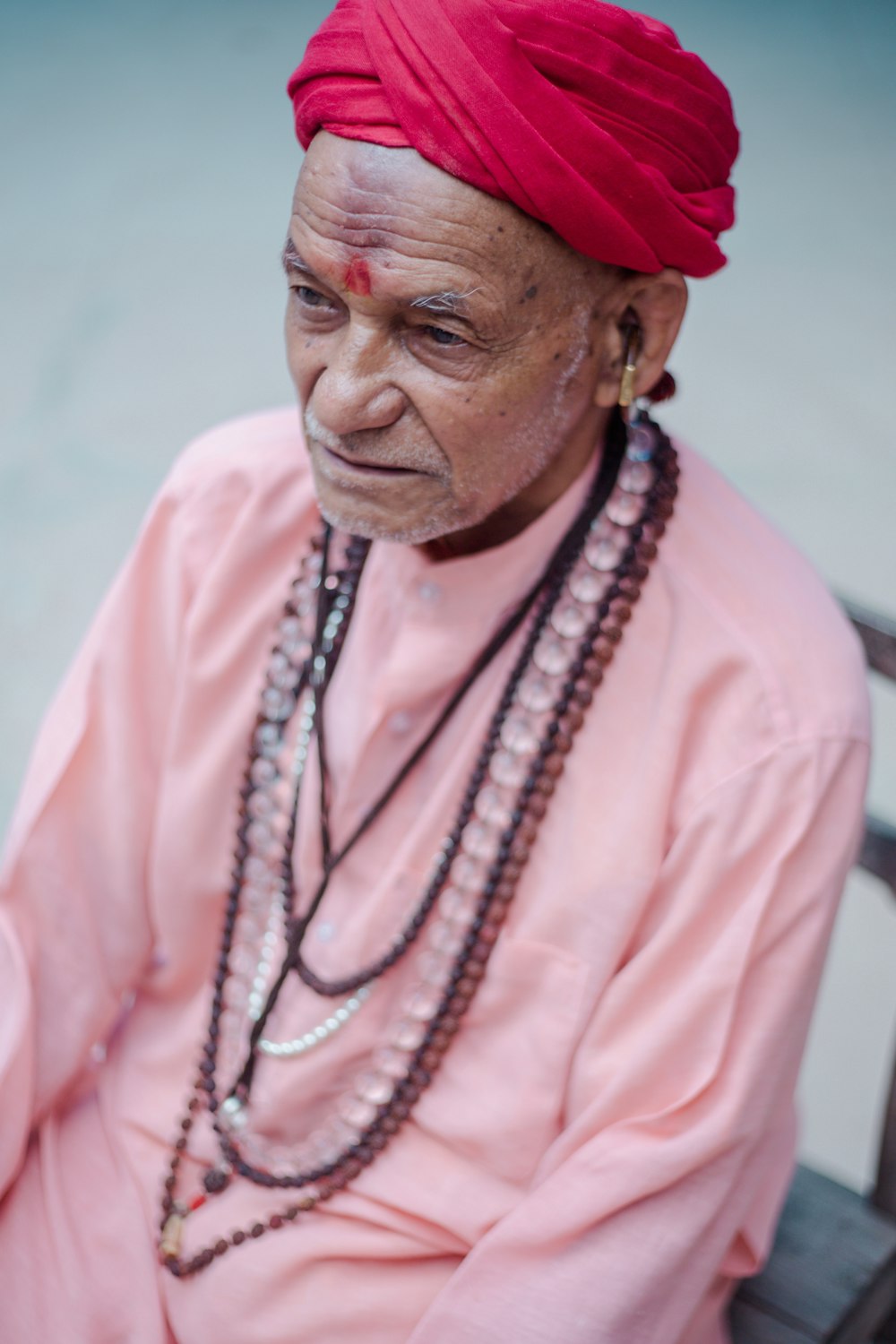 man wearing red turban