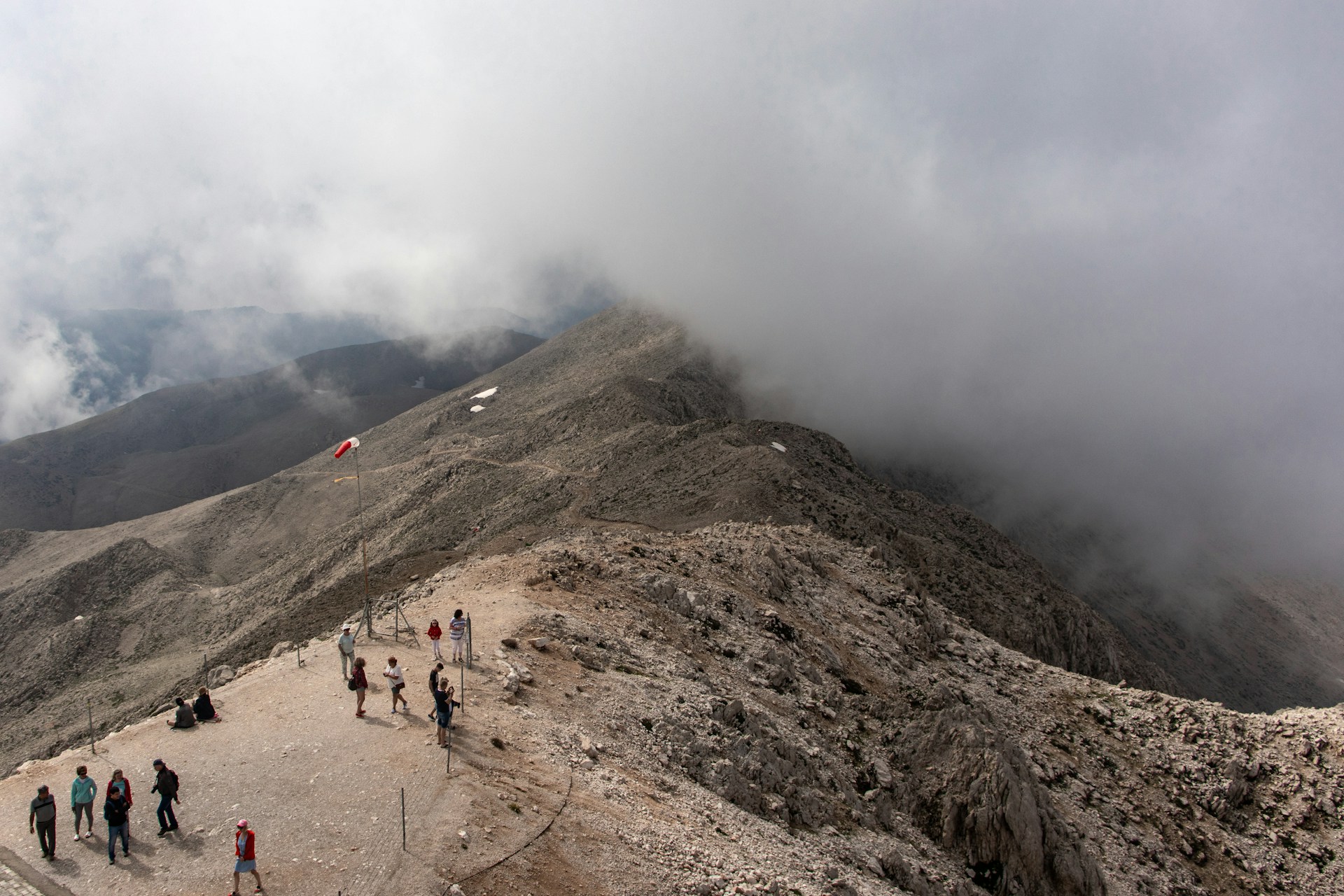 aerial photo of people at top of mountain