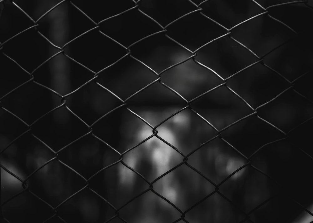grayscale photo of chain link