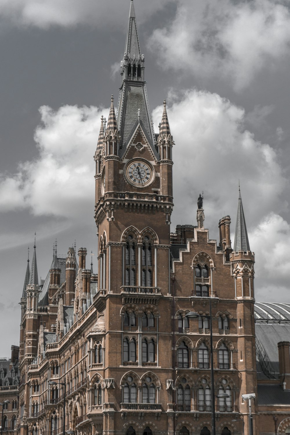 building with clock tower during day