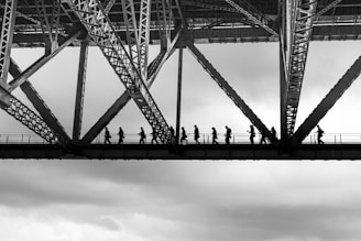 people walking on bridge