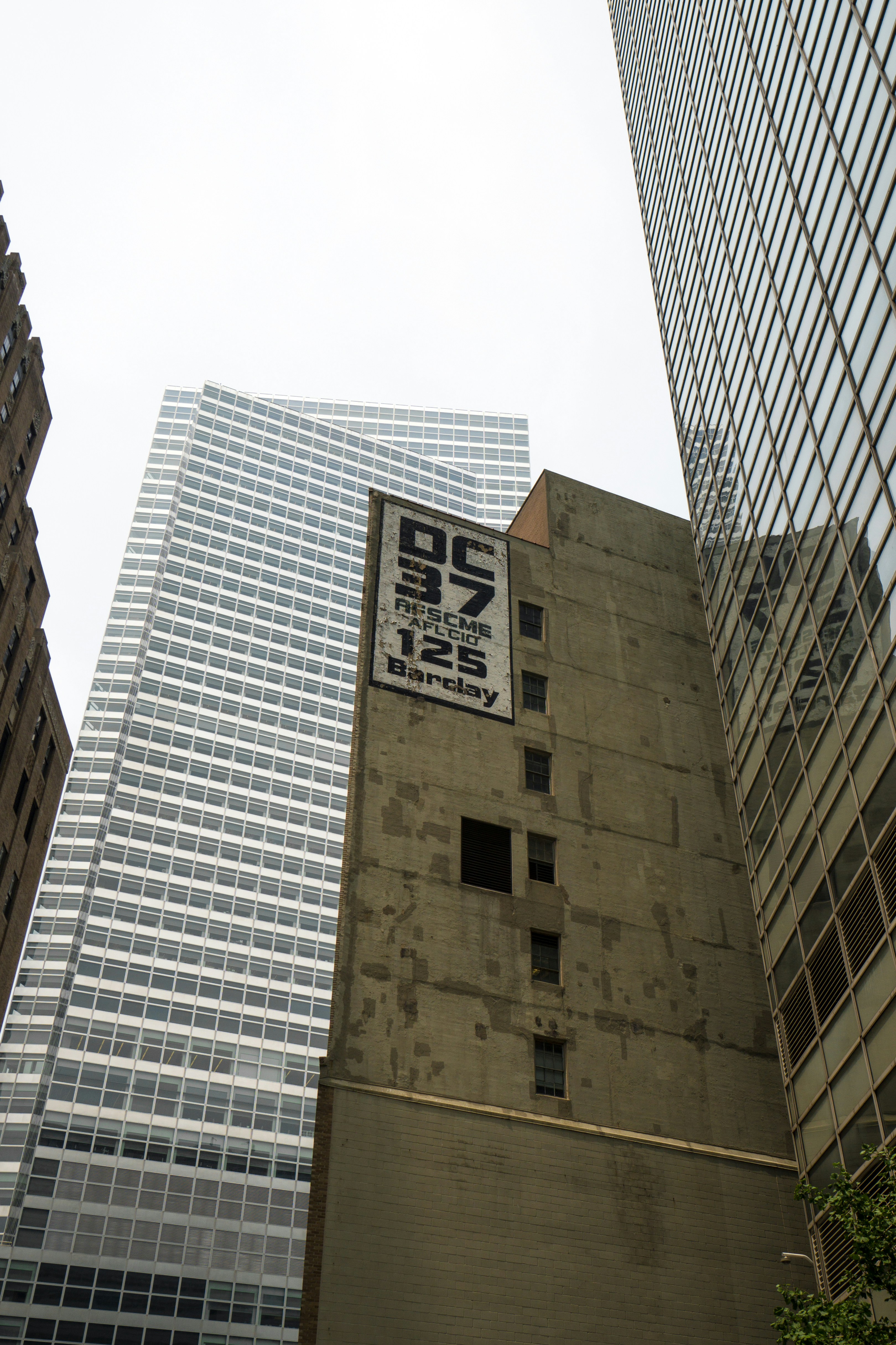 Grey curtain buildings during daytime photo – Free 125 barclay st Image