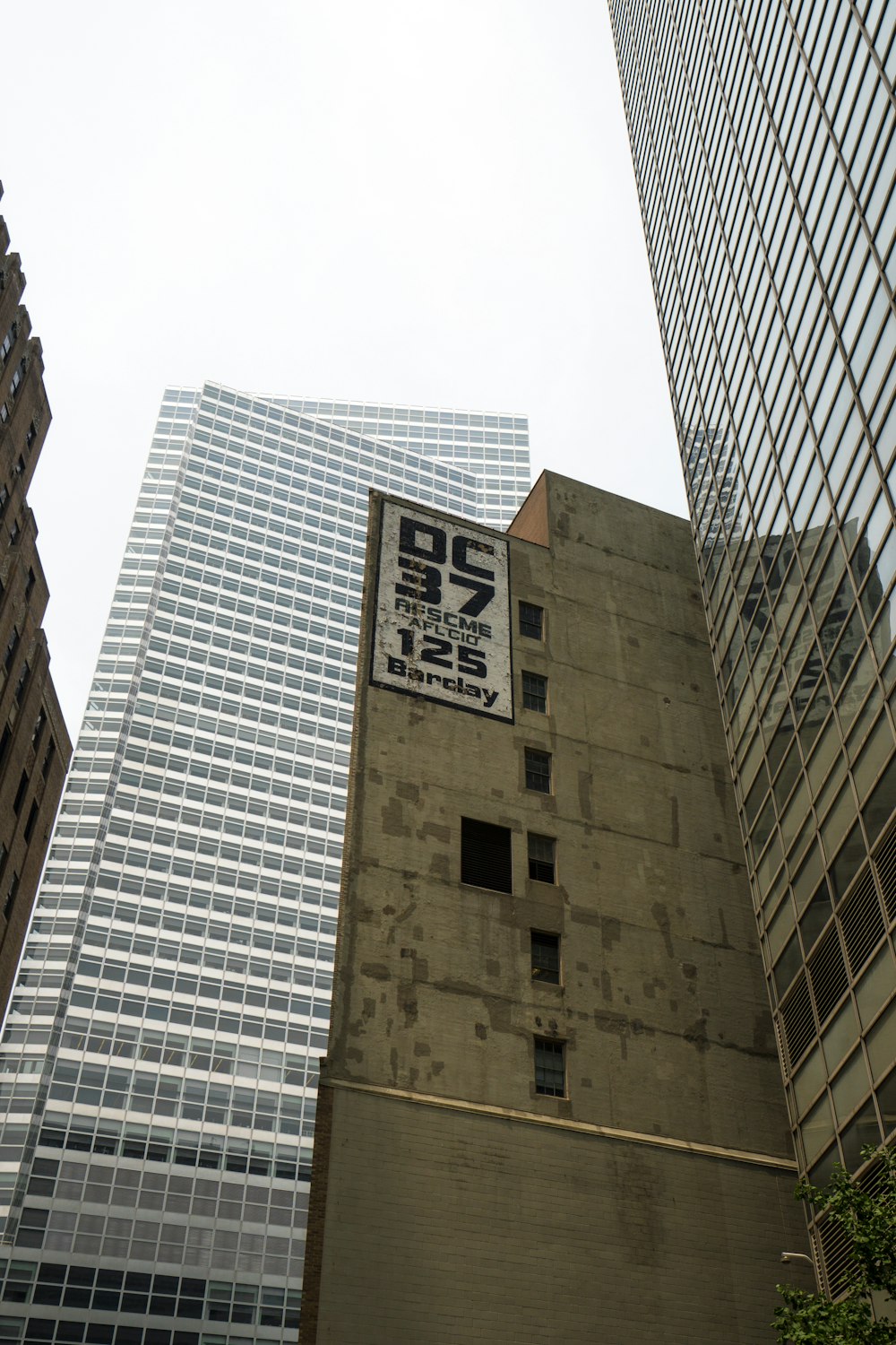 grey curtain buildings during daytime