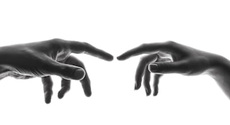 two person's connecting fingers