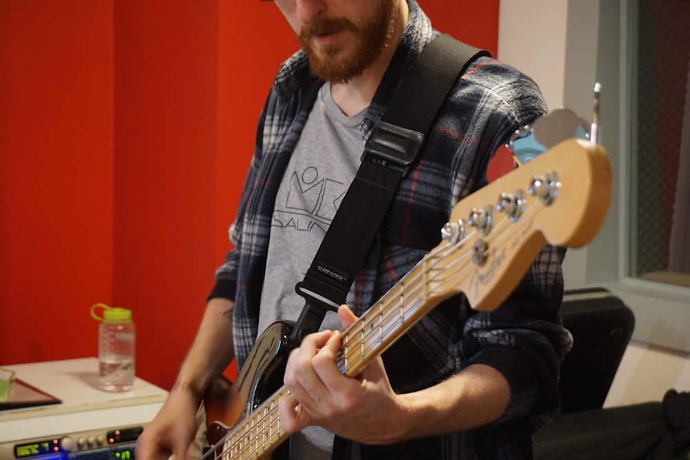 man playing guitar