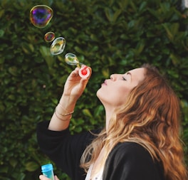 woman making bubbles