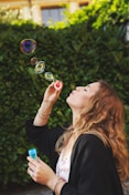 woman making bubbles
