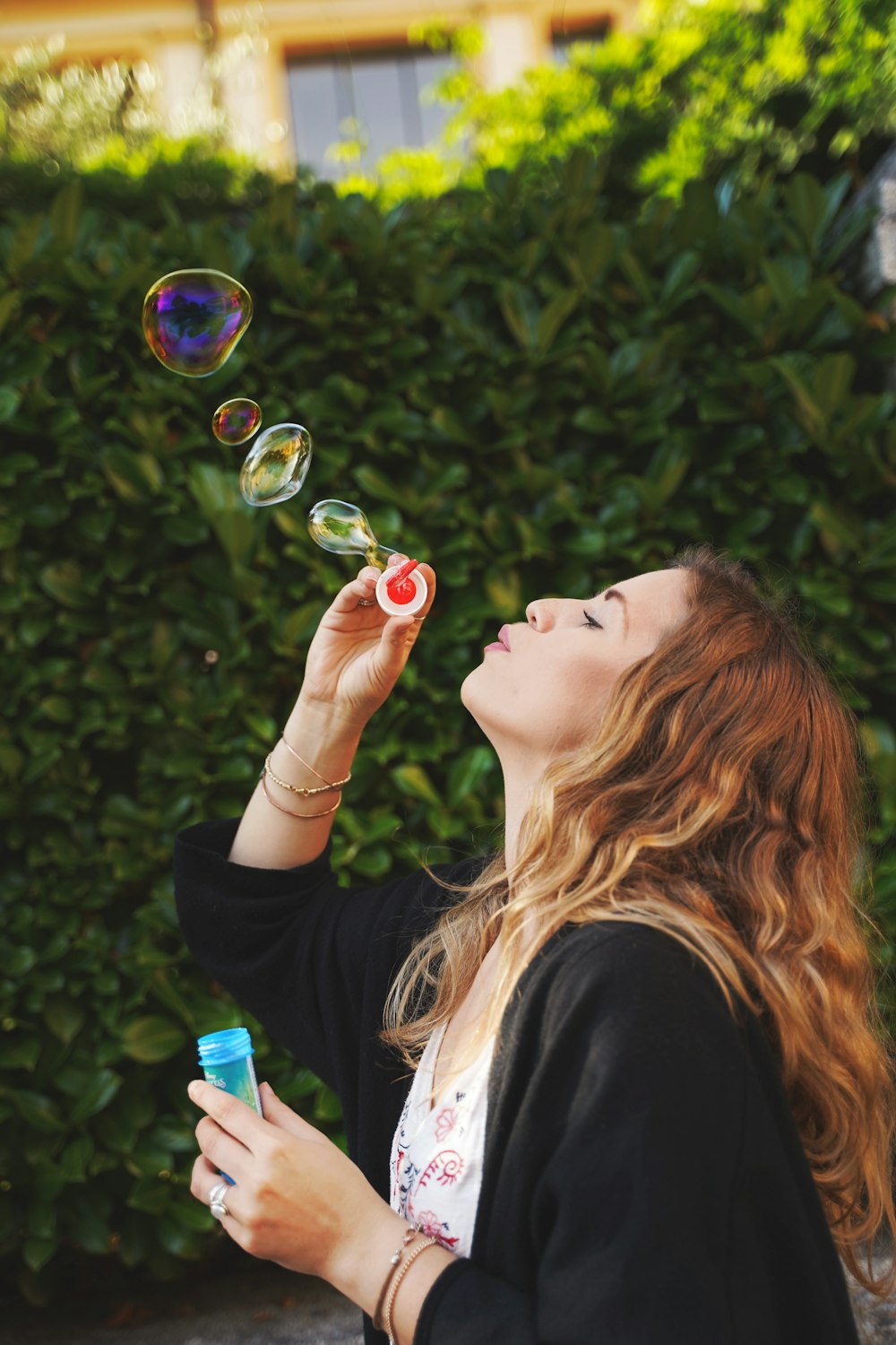 woman making bubbles