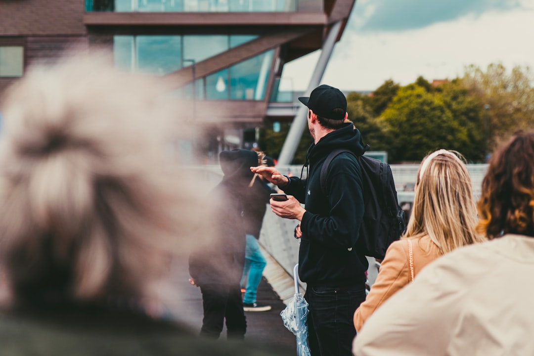 people standing near building