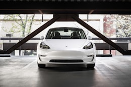 Deutsche Bank Analyst Downgrades Tesla Rating, Citing Model 2 Push-Out and Robotaxi Strategy